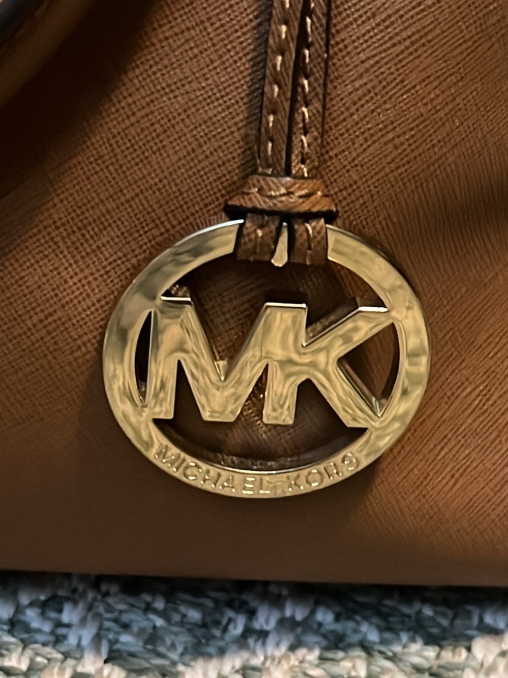 Michael Kors Gold Logo Charm on Brown Leather Strap